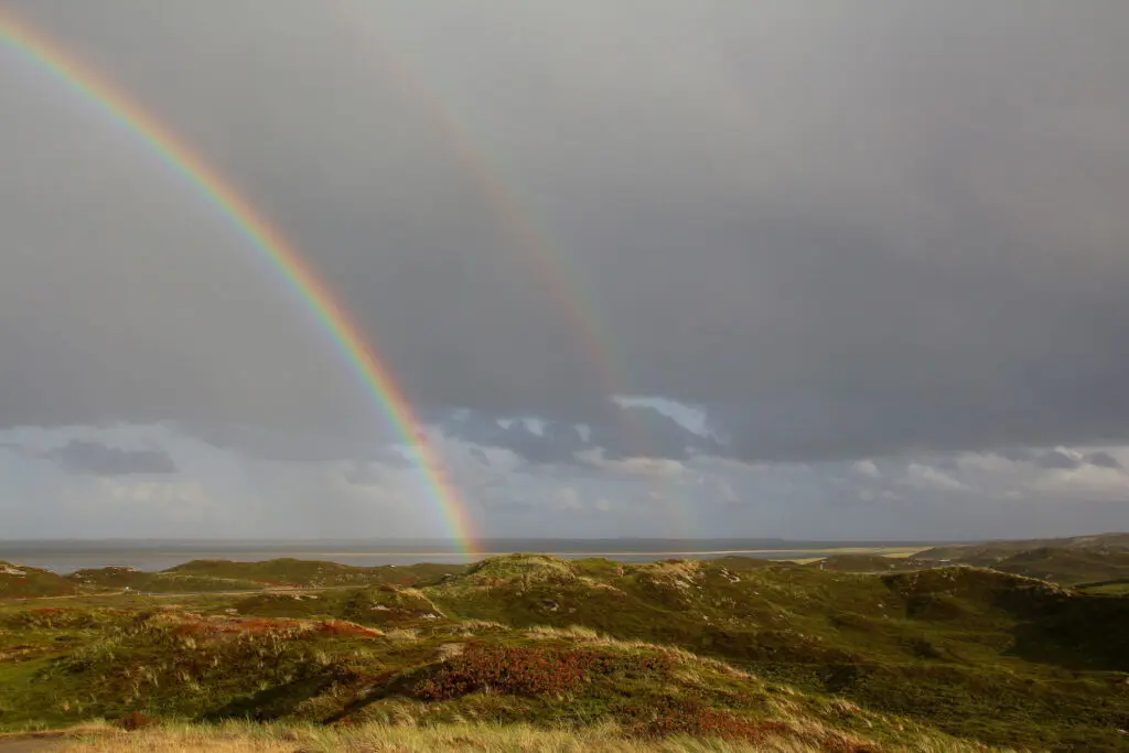 Regenbogen über den Dünen auf Sylt
