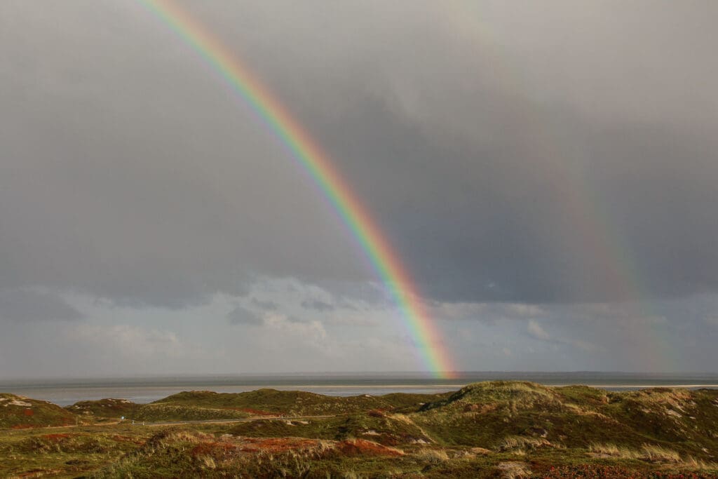 Regenbogen über den Dünen auf Sylt