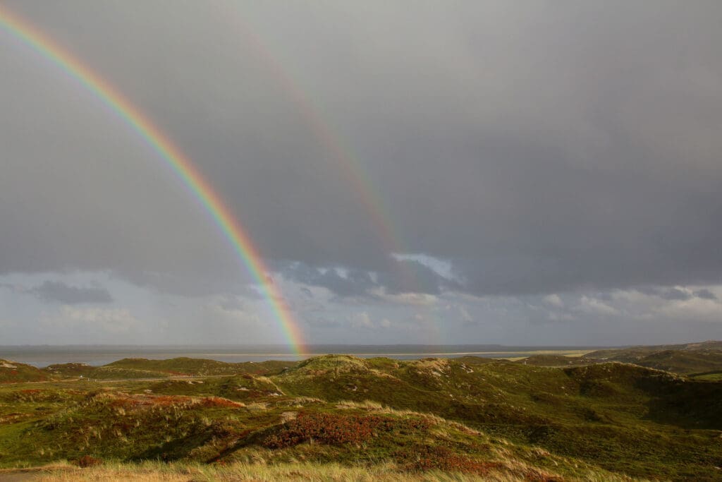 Regenbogen über den Dünen auf Sylt
